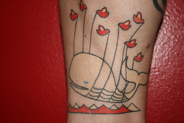 Bird tattoos – what do they mean? A flock of birds.